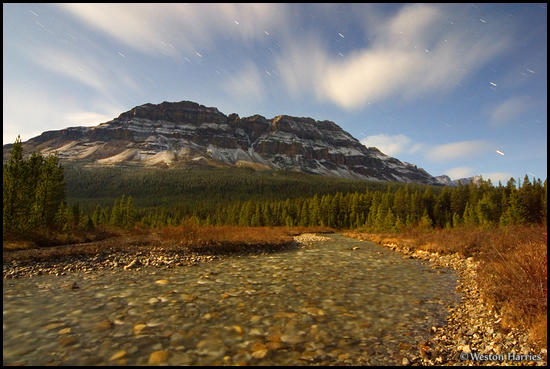 - Mosquito Creek and Bow Peak illuminated by moonlight, Banff NP, Canada -
