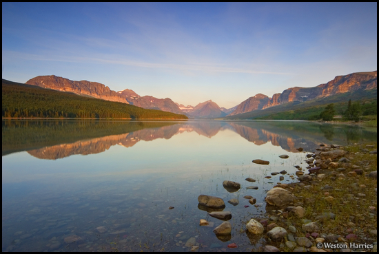 - Sunrise on the Many Glacier Area, Reflected in Lake Sherburne, Glacier NP -