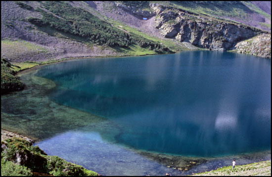 - Hiker on the Shore of Falling Leaf Lake, Glacier NP -