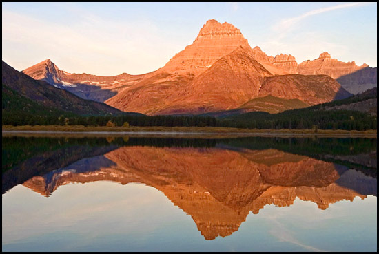 - Swiftcurrent Mtn and Mt. Wilbur Reflected in Swiftcurrent Lake, Sunrise, Glacier NP -