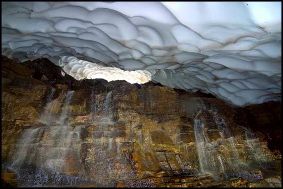 - Waterfall in the Middle of a Snow Cave, Glacier NP -