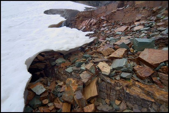 - Overhanging Melted Out Snowfield at the Top Entrance to a Snow Cave, Glacier NP -