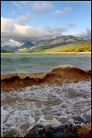 - Large Wave Breaking on the Shore of Lake Sherburne, Glacier NP -