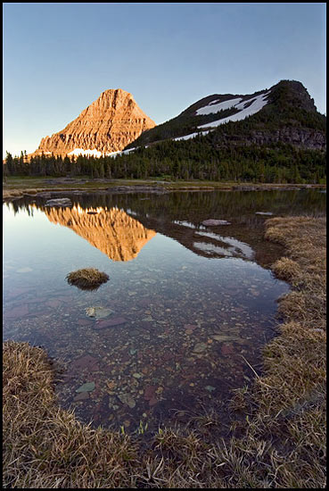 - Sunset Light on Reynolds Mtn, Reflected in a Seasonal Pond, Glacier NP -