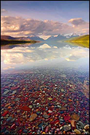 - Colorful Pebbles Below the Surface of Lake McDonald, with a Reflection of Stanton, Cannon, Brown, and Edwards Mountains, Glacier NP -
