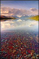 - Colorful Pebbles Below Lake McDonald, with Reflection of Mtns, Glacier NP -