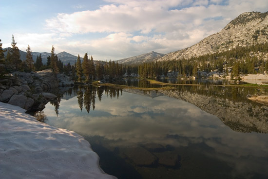 - Snowy Shoreline and a Reflective Lake in Granite Basin, Kings Canyon NP -