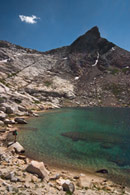 - Backpacker on the Shore of Upper Monarch Lake, Below Mineral Peak, Mineral King Area, Sequoia NP -